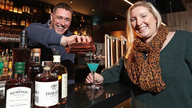 Destination Southern Tasmania's Alex Heroys (left) with Emma Gilligan from the Tasmanian Whisky and Spirits Association at the launch of Tasmanian Whisky Week. Picture: LUKE BOWDEN