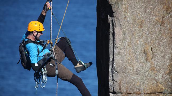 Paul Pritchard, mountaineer paralysed down one side, climbing the Totem Pole in Tasmania in 2016. Pic supplied.