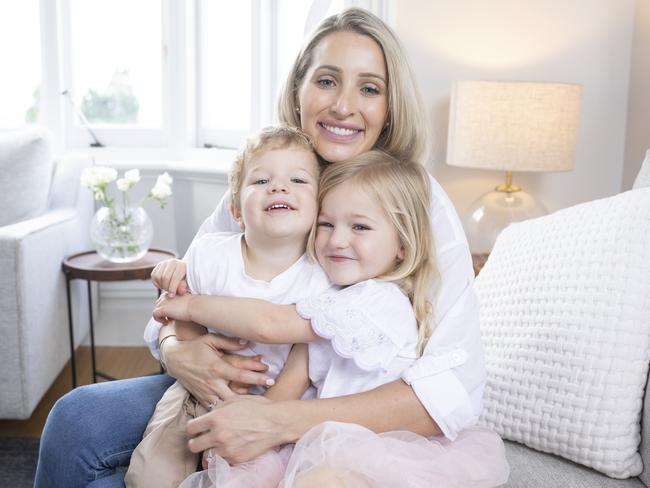 Bonnie Paine, wife of cricketer Tim Paine, with their two children Milla, 3, and Charlie, 2. Picture: Eddie Safarik