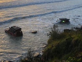 Car stuck in water at Teewah Beach. Picture - Facebook/Ice Man.