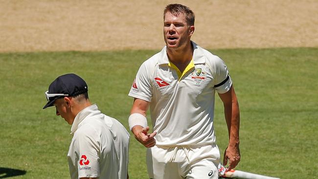 David Warner has a few words for Tom Curran. Picture: Getty Images