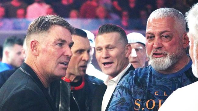 Gatto with Shane Warne and Danny Green at a boxing match in 2019. Picture: Michael Dodge.