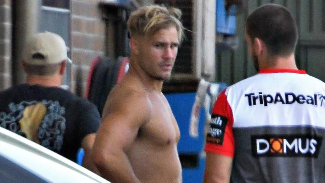 Jack de Belin training at WIN Stadium with team members last week after his initial court appearance Picture: Simon Bullard