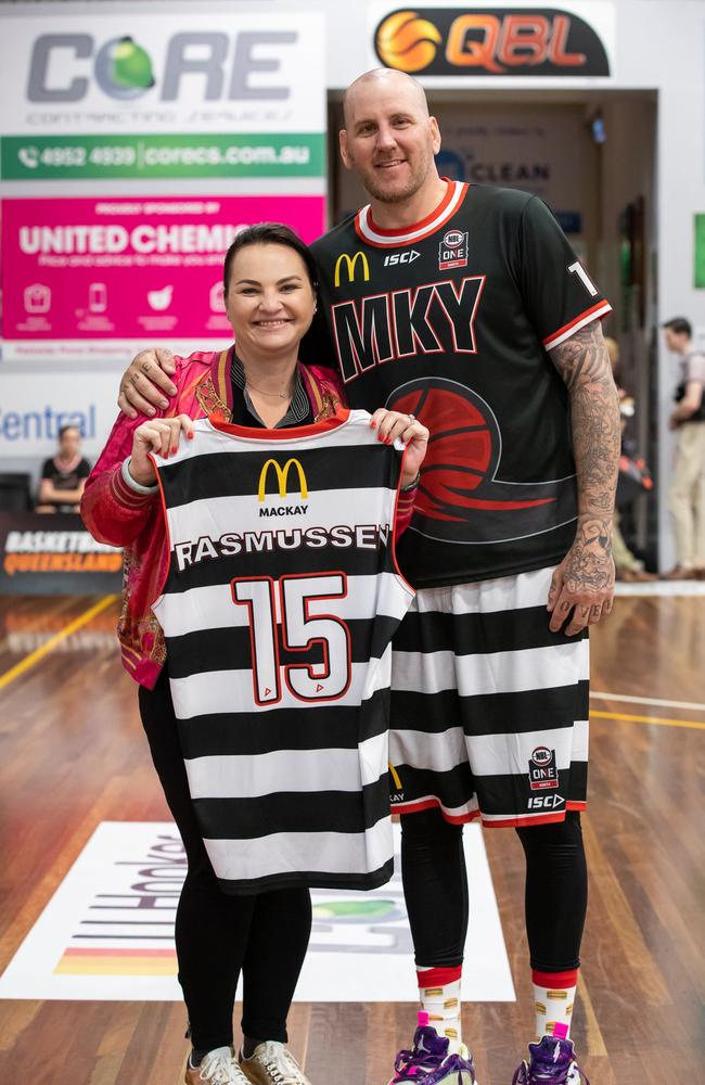 Niki Ramsay (left) won the auction for Bradley Rasmussen's match-worn jersey after Mackay Meteors defeated Cairns in the NBL1 North. Picture: Contributed