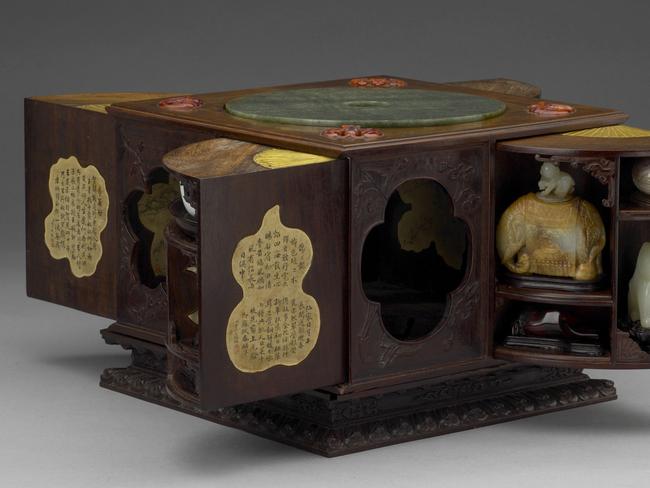 Qianlong 1736–95 Qing dynasty 1644–1911 'Square curiosity box with multiple treasures' wood, jade, bronze, amber, agate, ink on paper 19.9 x 25.4 x 25.2 cm (box) National Palace Museum, Taipei Photo: (c) National Palace Museum, Taipei. Supplied for Elizabeth FortescueQianlong 1736–95 Qing dynasty 1644–1911 'Square curiosity box with multiple treasures' wood, jade, bronze, amber, agate, ink on paper 19.9 x 25.4 x 25.2 cm (box)    National Palace Museum, Taipei     Photo: © National Palace Museum, Taipei       ***This image may only be used in conjunction with editorial coverage of the ‘Heaven and earth in Chinese art: treasures from the National Palace Museum, Taipei’ exhibition on display 2 February – 5 May  2019, at the Art Gallery of New South Wales. This image may not be cropped or overwritten. Prior approval in writing required for use as a cover. Caption details must accompany reproduction of the image. Media contact: Hannah.McKissock-Davis@ag.nsw.gov.au *** Local Caption ***  ***This image may only be used in conjunction with editorial coverage of the ‘Heaven and earth in Chinese art: treasures from the National Palace Museum, Taipei’ exhibition on display 2 February – 5 May  2019, at the Art Gallery of New South Wales. This image may not be cropped or overwritten. Prior approval in writing required for use as a cover. Caption details must accompany reproduction of the image. Media contact: Hannah.McKissock-Davis@ag.nsw.gov.au