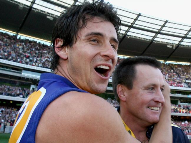 2006 AFL Grand Final match Sydney Swans vs West Coast Eagles at the MCG. Excited West Coast player Andrew Embley and coach John Worsfold after their win.
