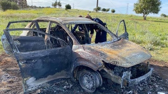 A 2019 Hyundai Kona hatchback used to take a man with a gunshot wound to hospital was found burnt out at Gould Creek. Picture: SA Police