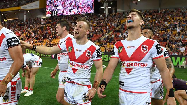 Dufty celebrates a Dragons try at Suncorp. Picture: AAP