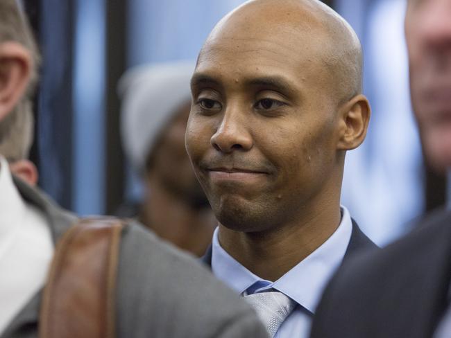 Former Minneapolis Police Officer, Mohamed Noor (C) returns to the Hennepin County Government Center after a lunch break during the second day of his trial. Picture: Angus Mordant/Newscorp Australia