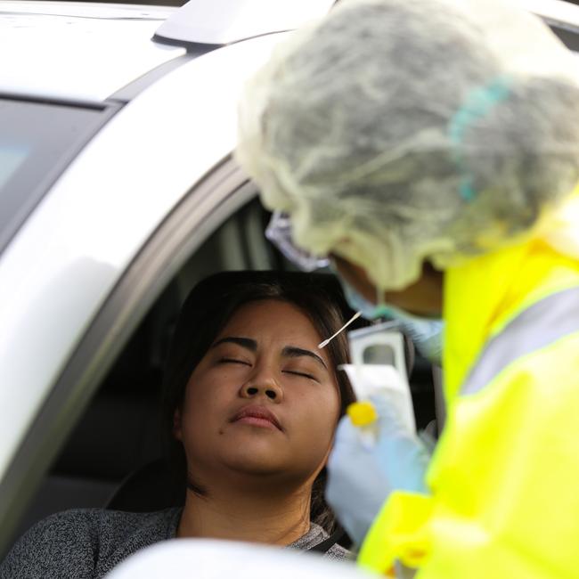 Gissella Martinez and her father Willy Martinez attend the pop-up testing clinic in Casula. Picture: NCA NewsWire/Gaye Gerard