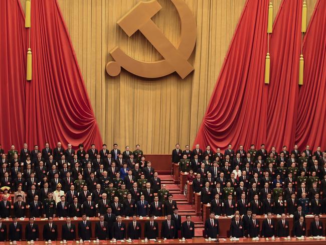 Delegates listen at the end of the closing session of the 19th Communist Party Congress in Beijing. Picture: Wang Zhao/AFP