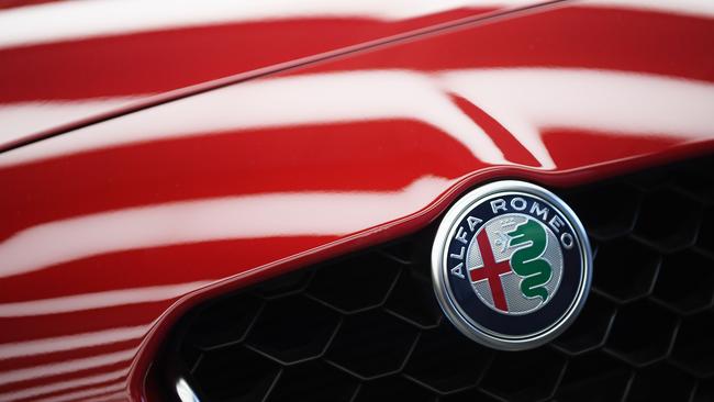 The stolen Alfa Romeo was crashed down an embankment. Picture: AFP (File)