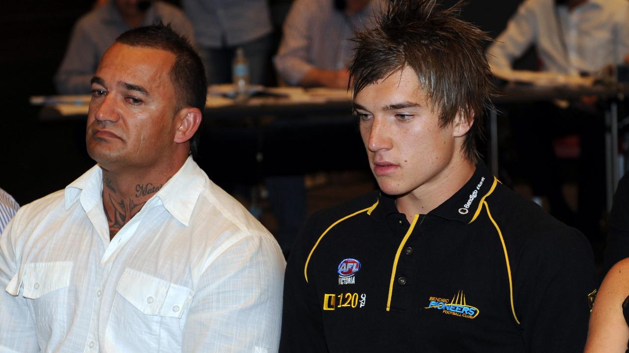 Martin with his late father Shane on AFL Draft night in 2009.