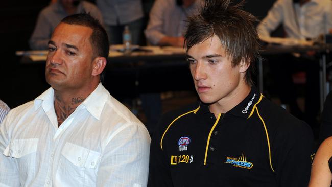 Martin with his late father Shane on AFL Draft night in 2009.