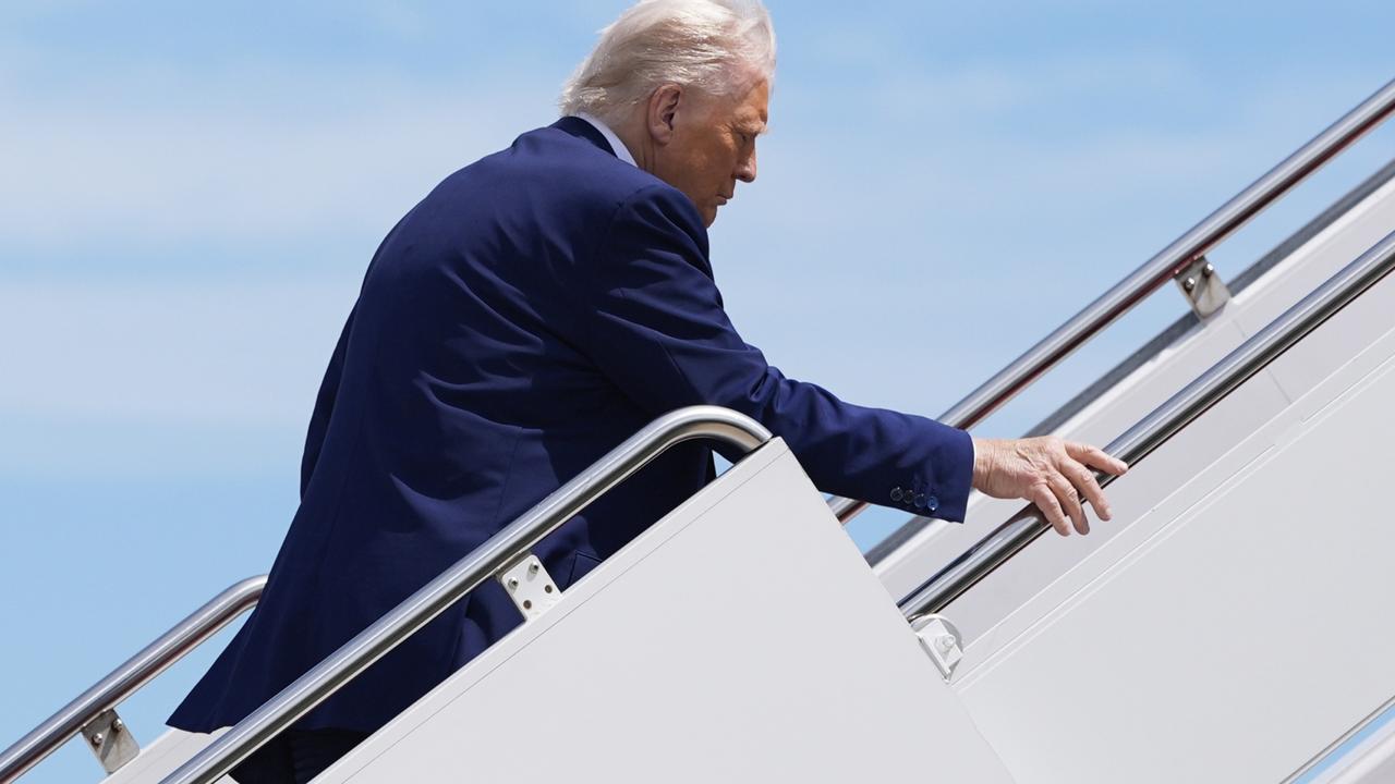 Mr Trump boards Air Force One. Picture: Alex Brandon/AP