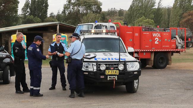 Police and Rural firefighters at Numeralla near the scene of a crashed water tanker plane. Picture: Mark Evans/AAP