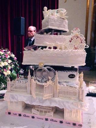 The elaborate multi-tiered wedding cake ... Playboy cover girl, bunny and model Cathy Schmitz, 24, married billionaire Richard Lugner, 81. Picture: Cathy Schmitz / Facebook