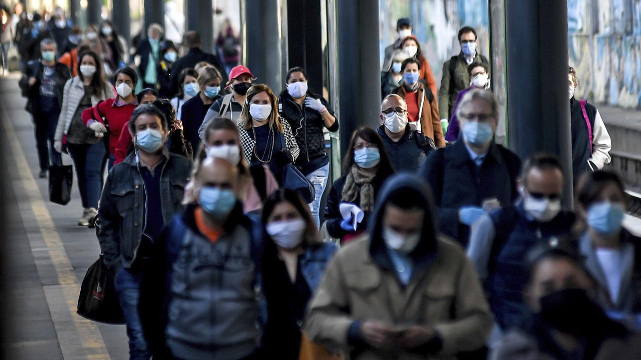 Commuters crowd Cadorna train station in Milan, Italy after the lockdown was eased. Picture: Claudio Furlan/LaPresse via AP
