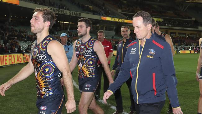 Adelaide’s Richard Douglas and Don Pyke leave the oval after the loss. Picture: Sarah Reed