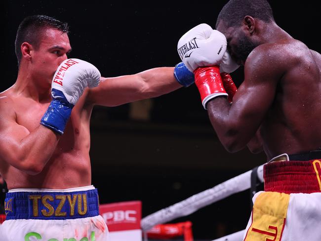 Mendoza got his first glimpse of Tszyu up close when the Aussie fought Terrell Gausha (R) last year. Picture: Adam Bettcher/Getty Images