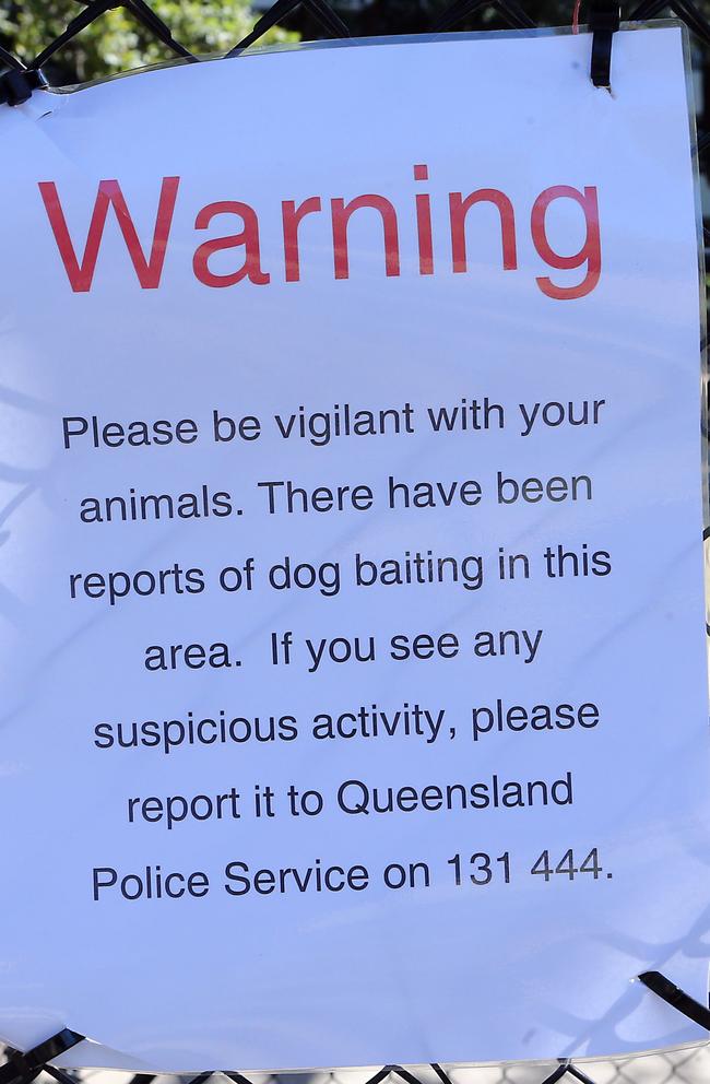 New Farm Park was covered in warnings for dog owners to be mindful after a spate of poisonings. Picture: AAP/Richard Gosling.