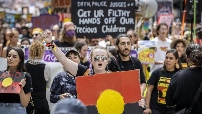 Protesters march peacefully through the city. Picture: Jake Nowakowski