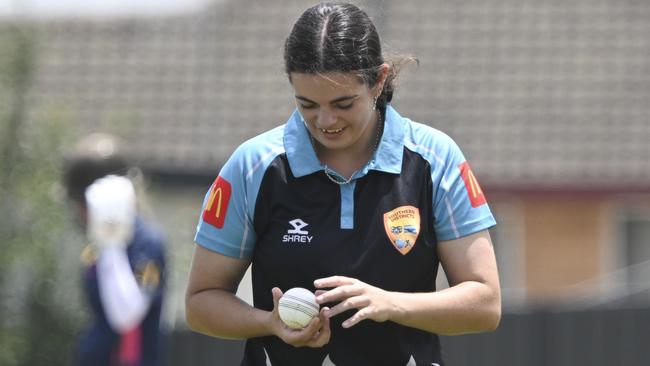 QUEANBEYAN, AUSTRALIA. DECEMBER 19, 2023: 10 Natalia Egan (Bowling). Southern Districts U16 (Fielding/ light blue) vs Riverina (Batting / red&blue) during the Mcdonald's Under 16 Female Country Championships at Freebody Ovals, Queanbeyan New South Waless. Picture: Martin Ollman