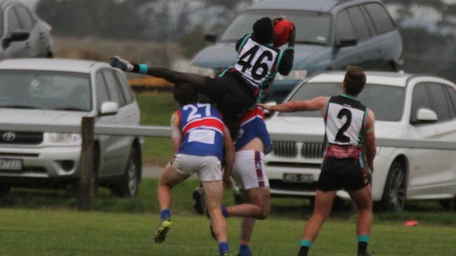 Lual Lual flies high for a mark on his debut. Picture: Robert Gardiner