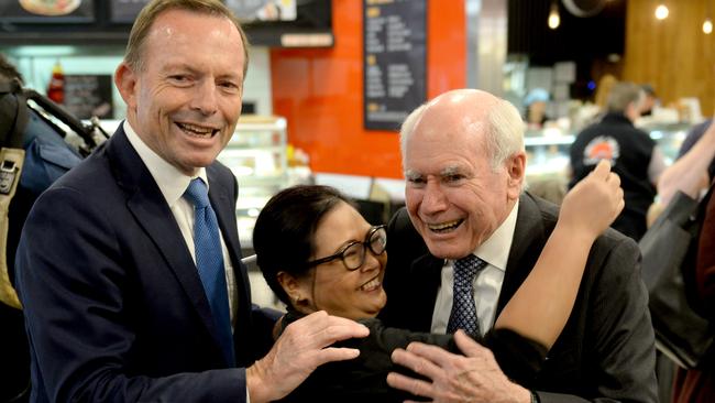 Former prime ministers Tony Abbott and John Howard hit the hustings at Warringah Mall in Sydney yesterday. Picture: AAP