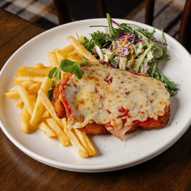 A classic chicken parmie loved by locals. Photo: The Cleveland Sands Hotel