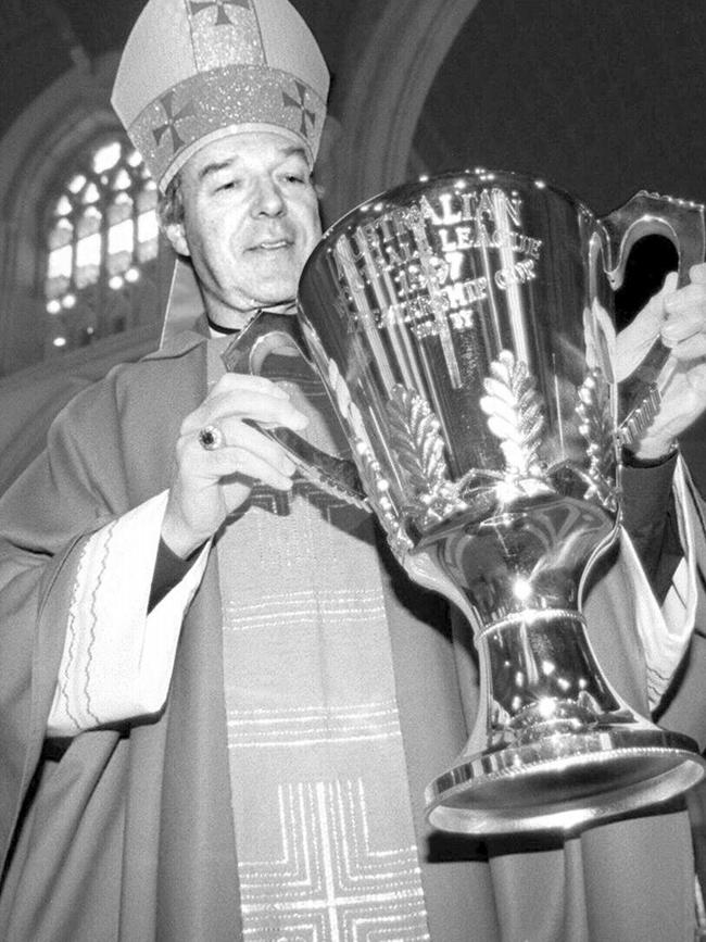 With the 1997 AFL Premiership cup while Melbourne Archbishop.