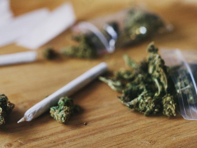 Shot of dried marijuana and a rolled joint. Cannabis clipseal bag generic image. Picture: iStock