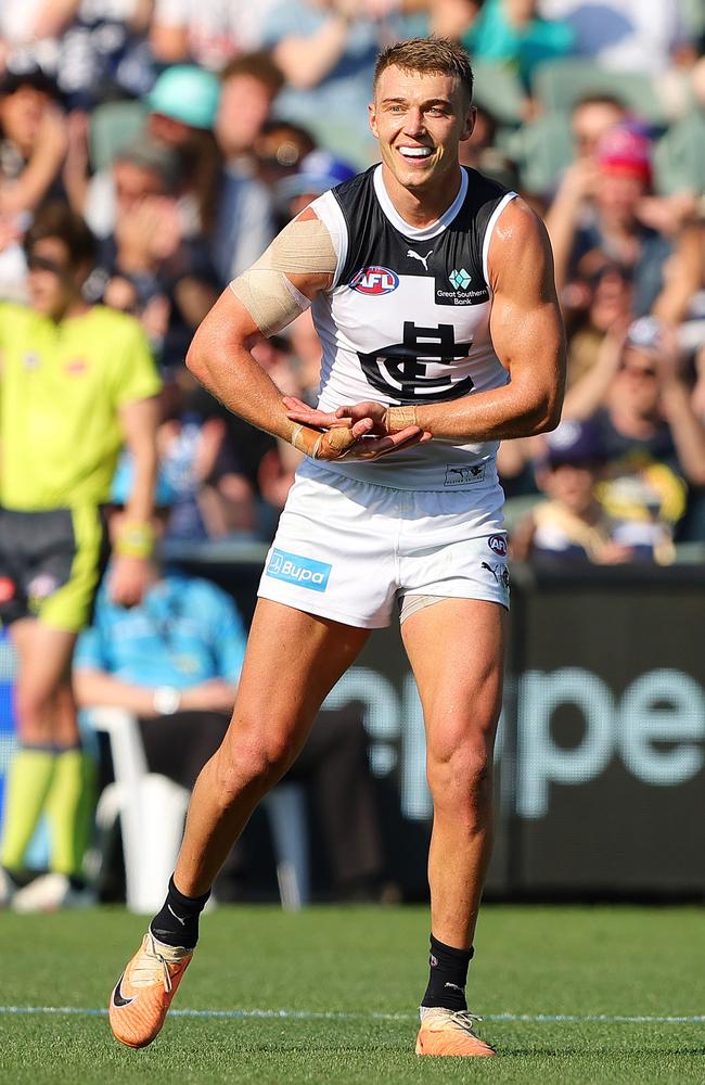 Patrick Cripps celebrates a goal by acknowledging the recent birth of his first child. Picture: Sarah Reed/AFL Photos