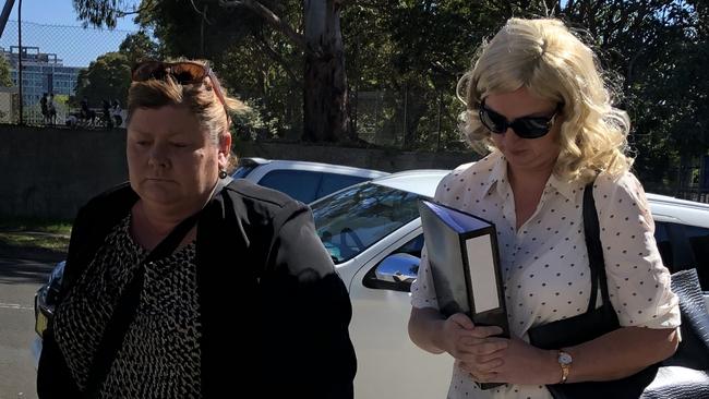 Cassandra Hingeley (right) arrives at court in her blonde wig. Picture: Madeline Crittenden.