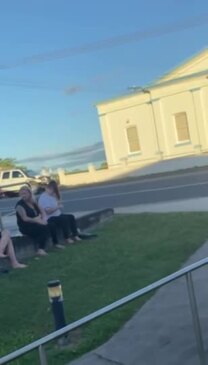 Supporters of Ben and Bronson Buggy wait outside Gympie watchhouse