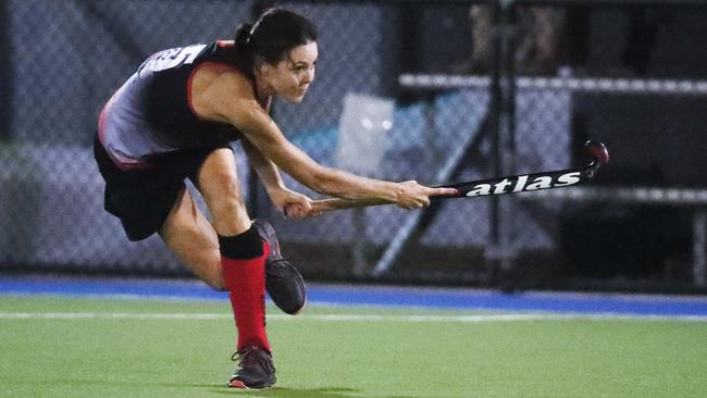 Souths' Patrice Butler passes down the field in the Cairns Hockey Women's A Grade match between South Cairns and Trinity Stingers. PICTURE: BRENDAN RADKE