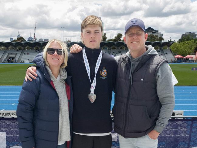 Travis McCombe (right) with son Marley and his wife, Kelli. Picture: Supplied