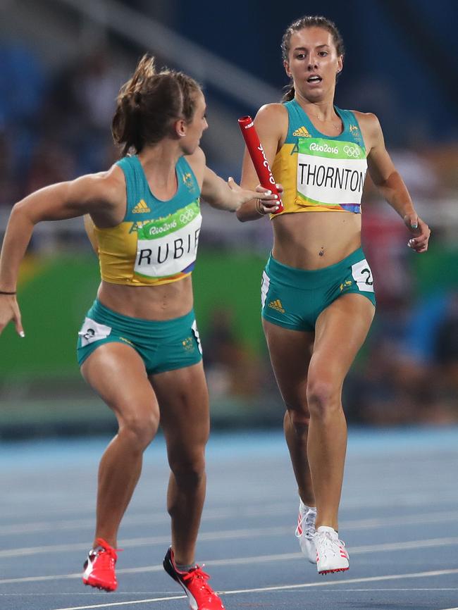 Australia's Jessica Thornton changes to Annelise Rubie in the 4x400m final in Rio. Picture. Phil Hillyard