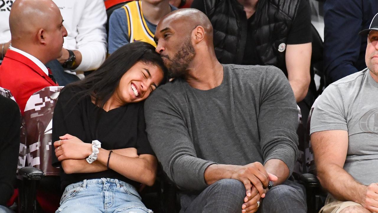 Kobe Bryant and his daughter Gianna Bryant attend a Los Angeles Lakers game. Photo by Allen Berezovsky/Getty Images.