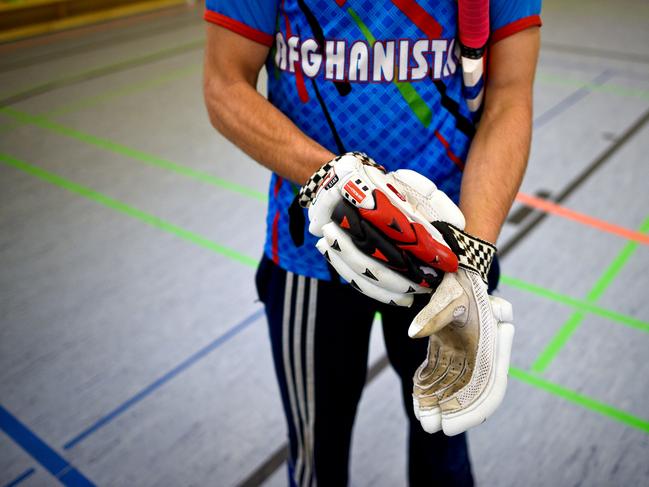 An Afghan refugee takes part in a Cricket training session at the team of the Altendorf 09 Blue Tigers in Essen, western Germany, on April 30, 2016. The influx of refugees into Germany, especially from cricket-mad Pakistan and Afghanistan, over the last 12 months has created a boom, leaving the German Cricket Federation (DCB) delighted, but overwhelmed. / AFP PHOTO / Sascha SCHÜRMANN / TO GO WITH AFP STORY