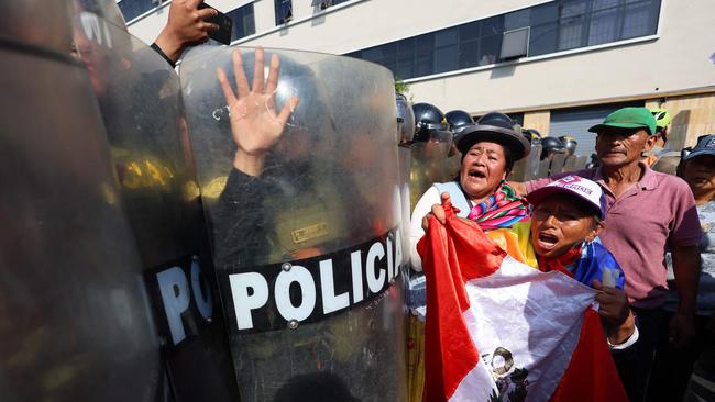 Demonstrators clash with the police as they take part in a protest against the Asia-Pacific Economic Co-operation summit in Lima, Peru. Picture: AFP