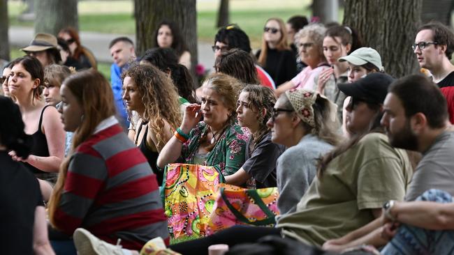 A crowd gathers to honour Victorian women who have lost their lives this year. Picture: Josie Hayden