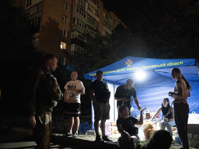 Medical workers an psychologists provide assistance and support to local residents and victims in Poltava. Picture: AFP