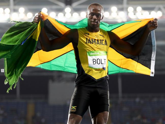 RIO DE JANEIRO, BRAZIL - AUGUST 18:  Usain Bolt of Jamaica celebrates winning the Men's 200m Final on Day 13 of the Rio 2016 Olympic Games at the Olympic Stadium on August 18, 2016 in Rio de Janeiro, Brazil.  (Photo by Ryan Pierse/Getty Images)