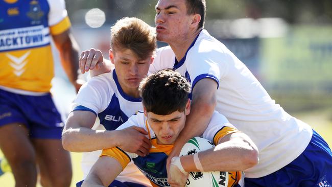 Sean Russell crashes over for the first try for Patrician Brothers. Picture: Jonathan Ng