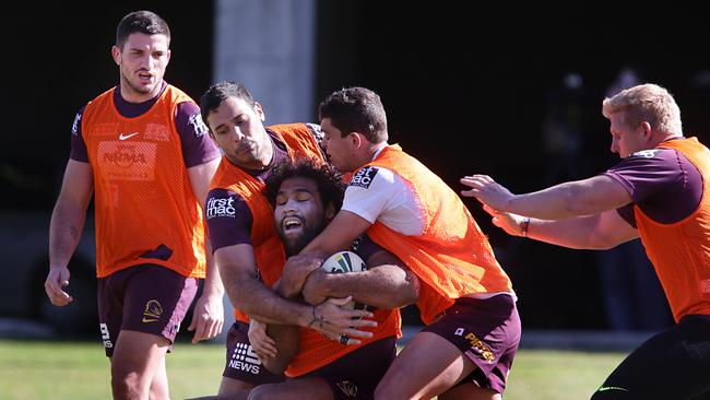 Sam Thaiday and Justin Hodges at training.