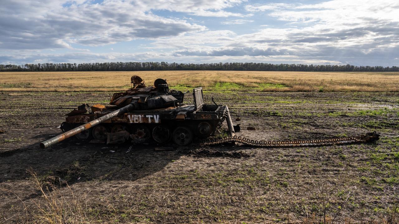 A Russian tank lies destroyed in a field near Izyum, Kharkiv oblast, Ukraine. Picture: Getty Images