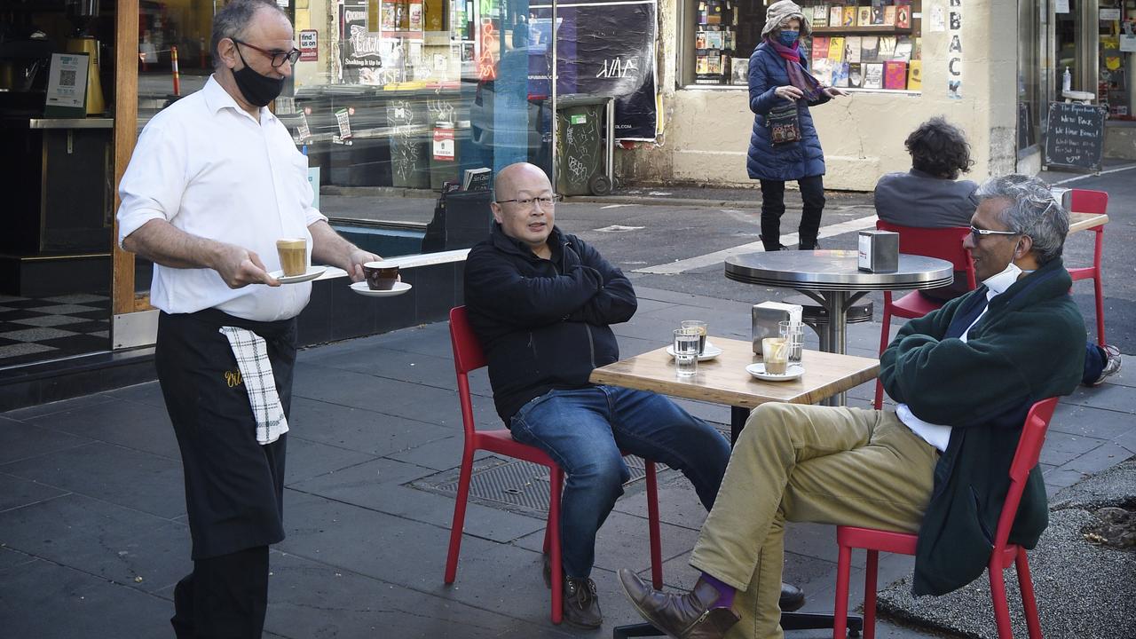 City of Melbourne is pushing for a pilot program for vaccine passports to immediately reopen struggling businesses. Picture: Andrew Henshaw