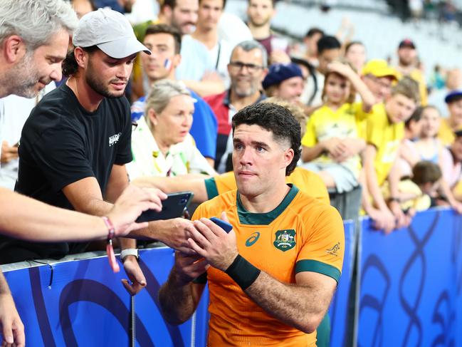 Ben Donaldson celebrates with fans after Australia’s win over Georgia at last year’s Rugby World Cup. Picture: Chris Hyde/Getty Images