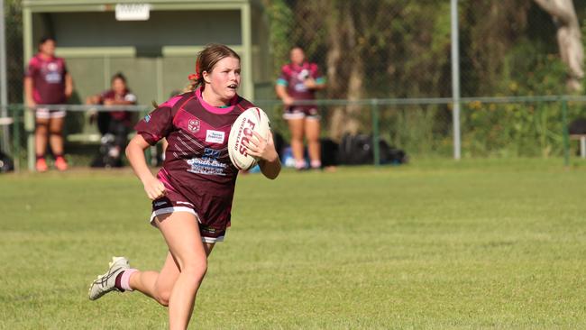 Lily-Rose Kolc carts the ball up. Pic: Colleen Edwards QRL